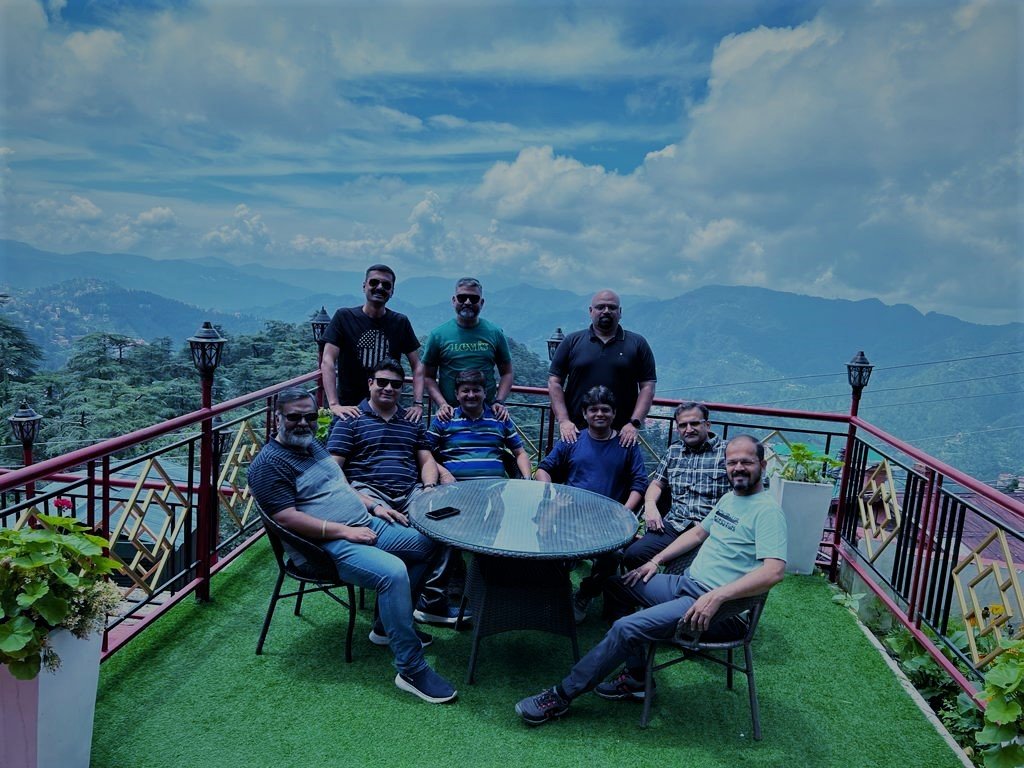 The group outside the guest house